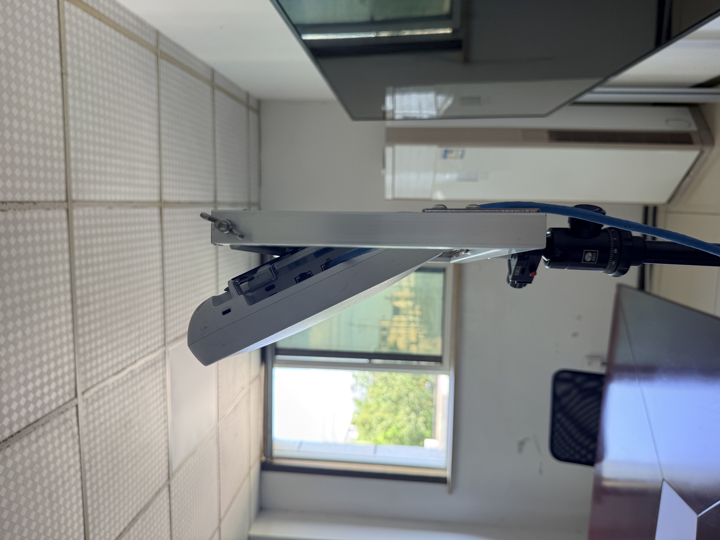 Access point positioned at an angle on an adjustable frame for a wireless survey